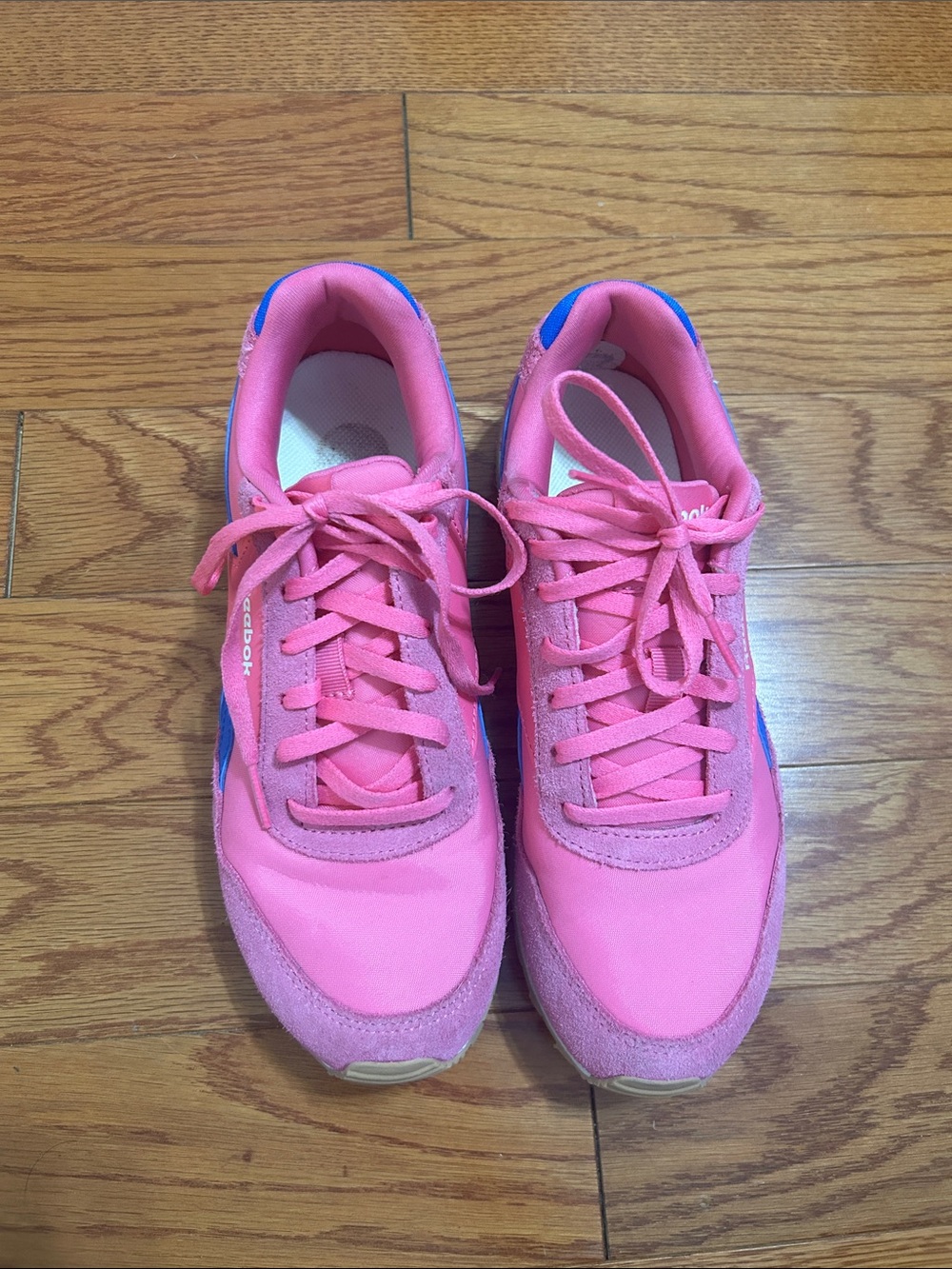 Reebok Women’s Pink Sneakers with Blue Accent
